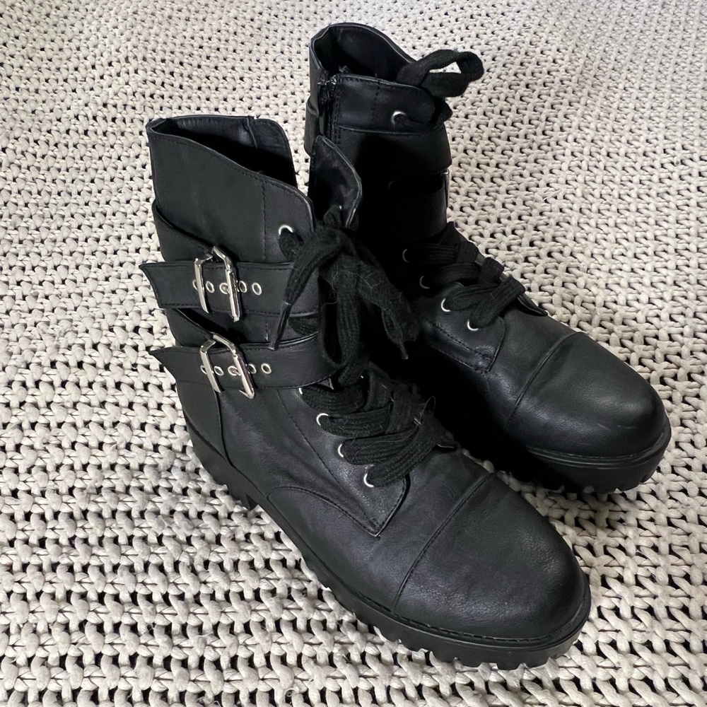 Black leather combat boots